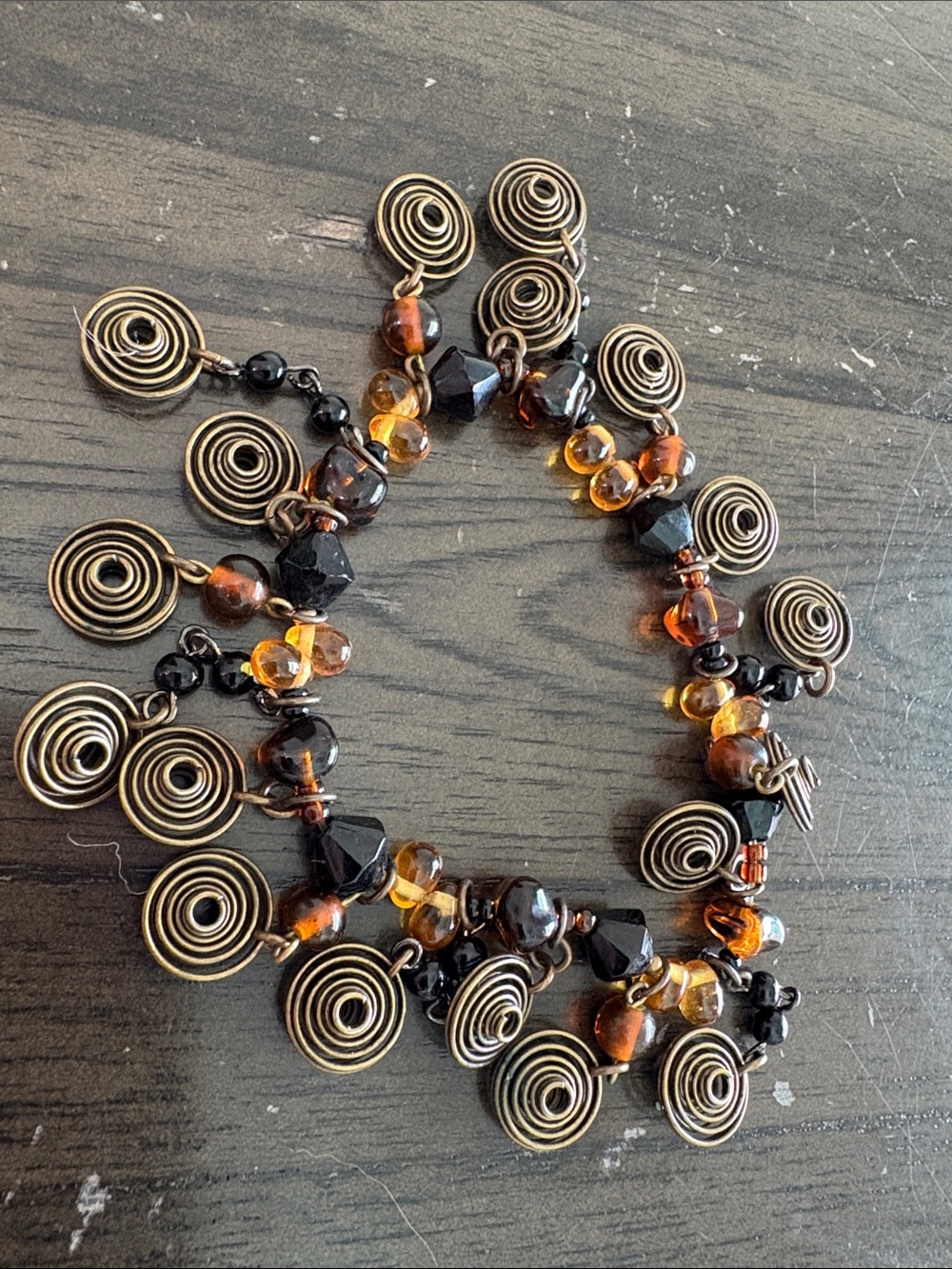Handmade Amber & Black Spiral Charm Bracelet